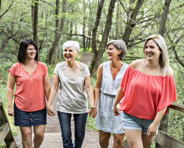 A groupe of women sister together with her senior mother